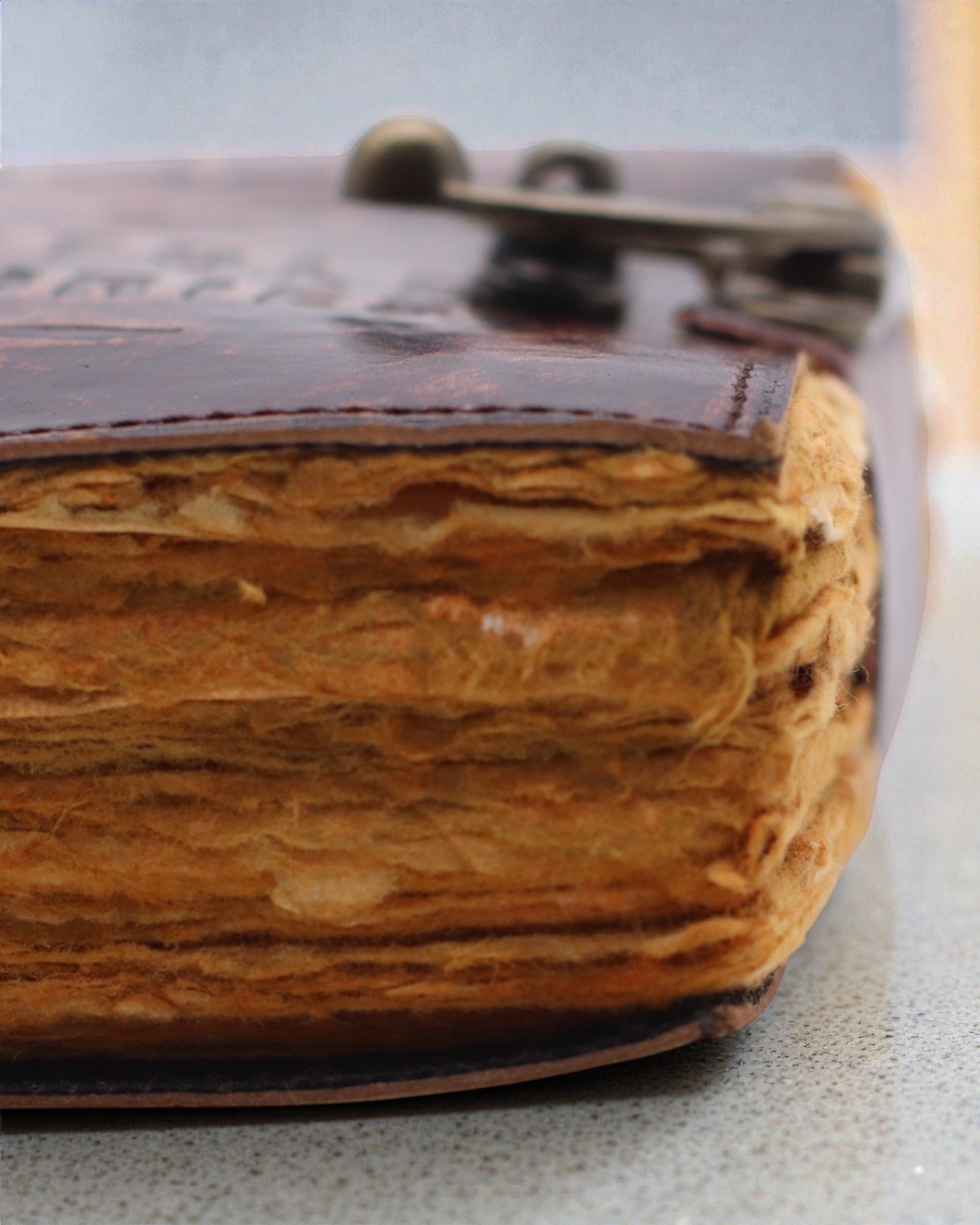 Antiqua Stories – leather notebook with aged pages 15 × 10 cm, The Notes of Untold Stories