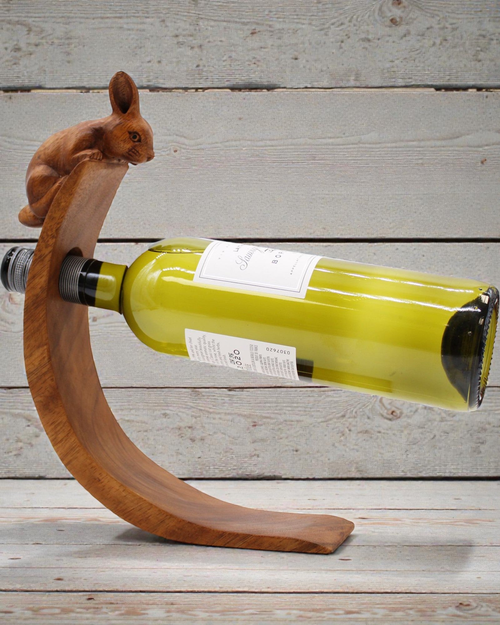 Sommelier’s Rabbit – Hand-Carved Balancing Wooden Bottle Stand Made of Suar Wood