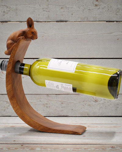 Sommelier’s Rabbit – Hand-Carved Balancing Wooden Bottle Stand Made of Suar Wood