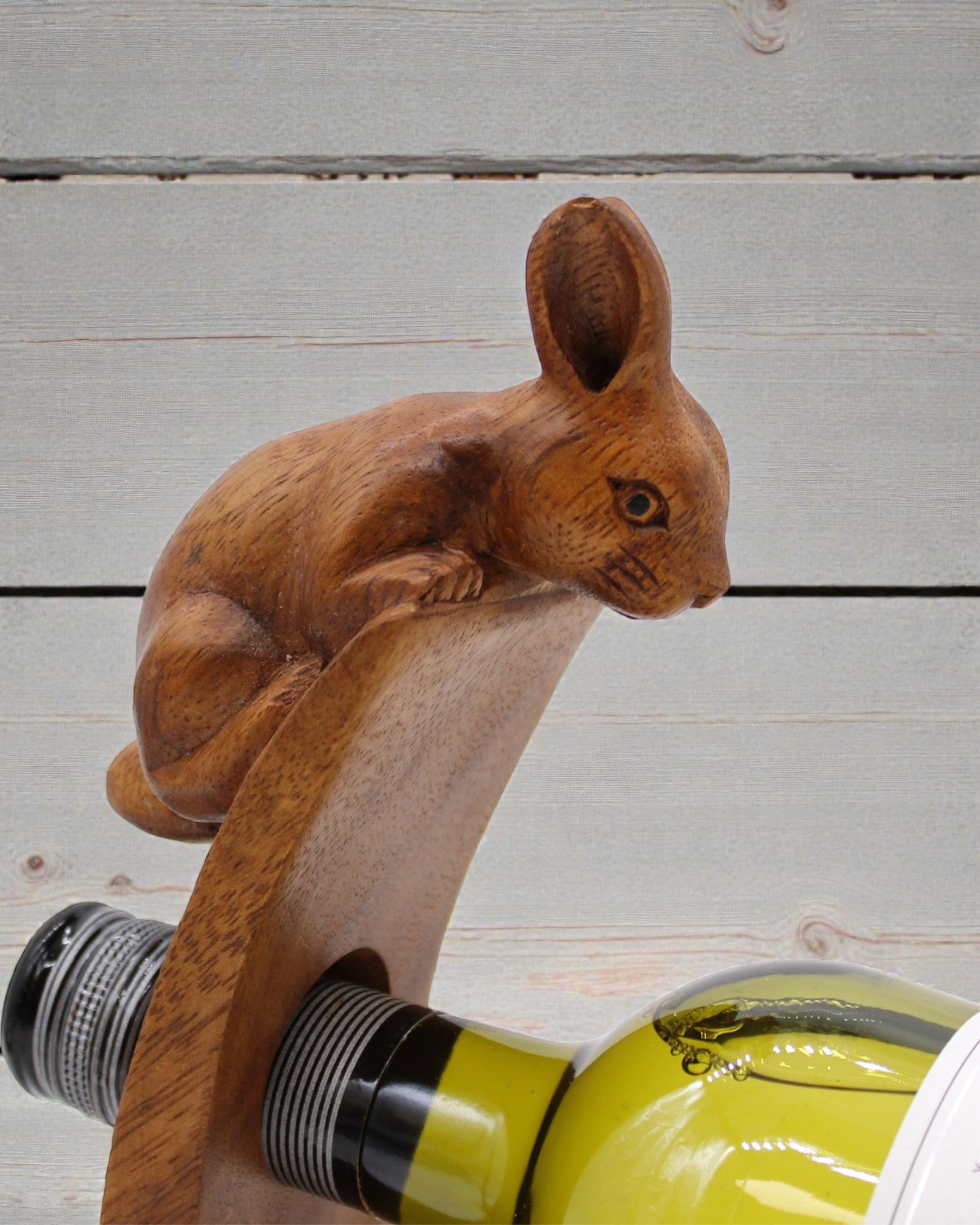 Sommelier’s Rabbit – Hand-Carved Balancing Wooden Bottle Stand Made of Suar Wood