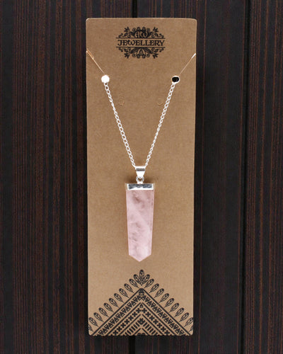 Rose Light – Flat Pendant of Rose Quartz in Crystal Cut