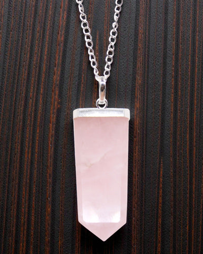 Rose Light – Flat Pendant of Rose Quartz in Crystal Cut