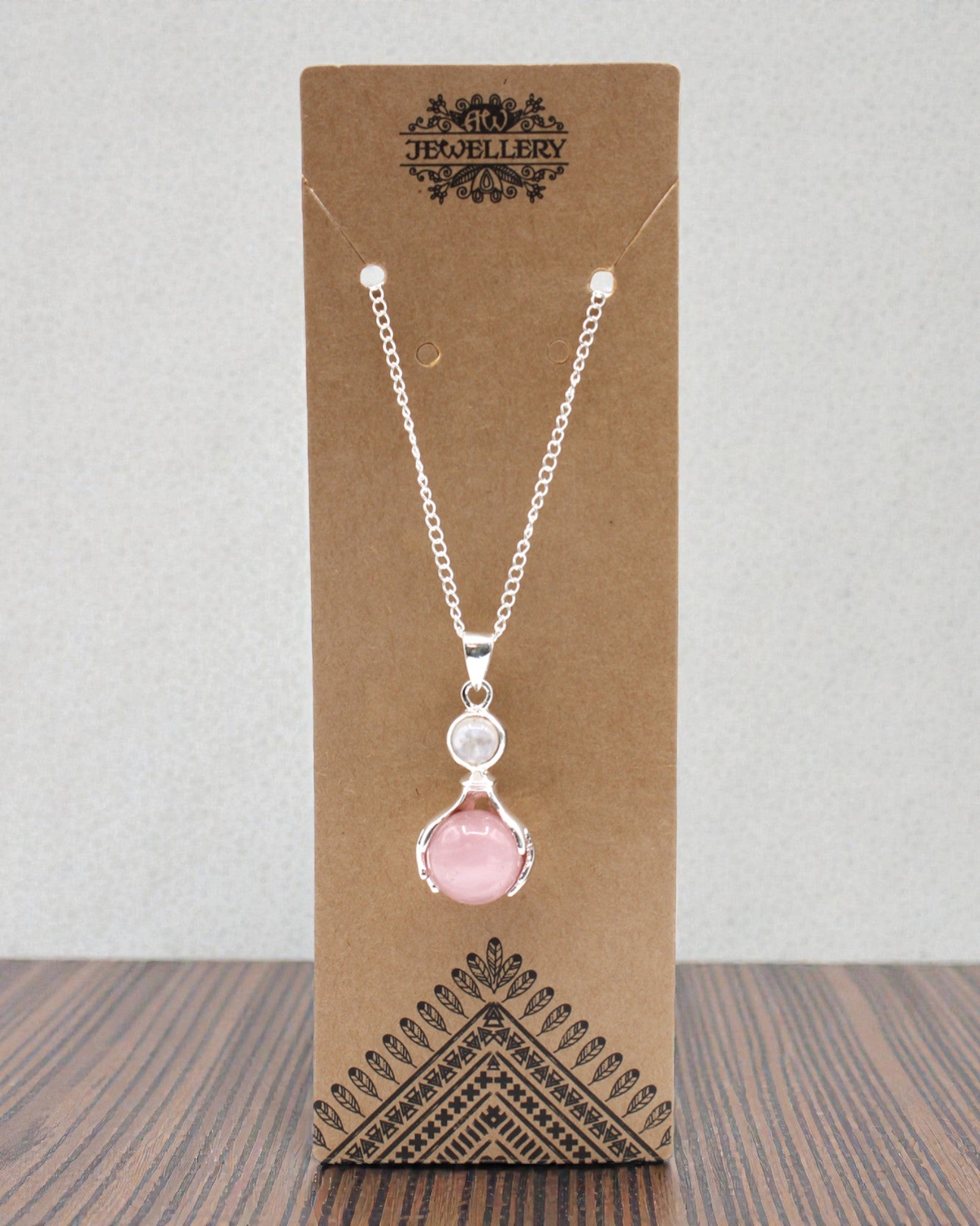 Crystal Hands – Pendant of Healing Hands in Rose Quartz