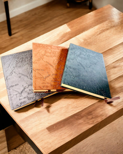 Sailing-themed "Nautica" notebooks with engraving personalization option, as a gift
