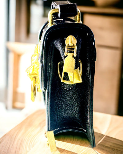 Fashionable Square Shoulder Bag with Lion Accent - color black