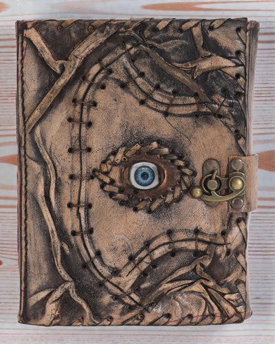 Ruda ir rusva užrašinė – „Piktoji akis“ puošyba – 160 puslapių su plėšytais kraštais – 17x12.5cm